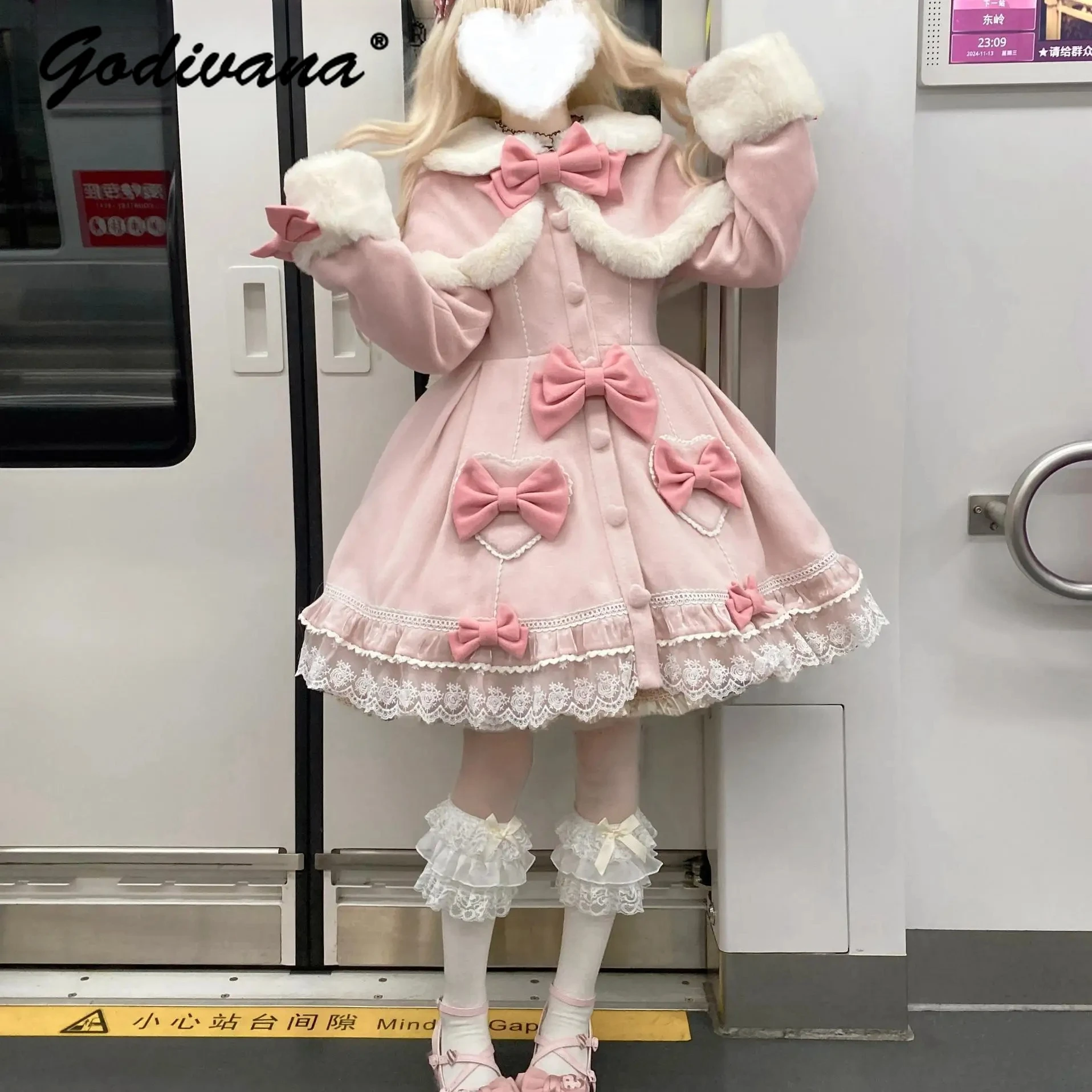 Nouveau hiver femmes doux fourrure arc Lolita laine manteau col de poupée filles mince dentelle épissé simple boutonnage laine veste pardessus