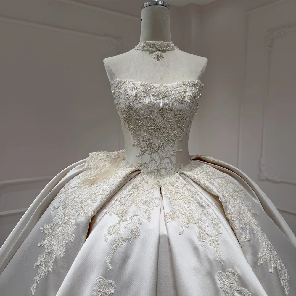 فستان زفاف قابل للتخصيص بدون حمالات مع أربطة خلفية، فستان عروس بدون أكمام مع تطريز 2026