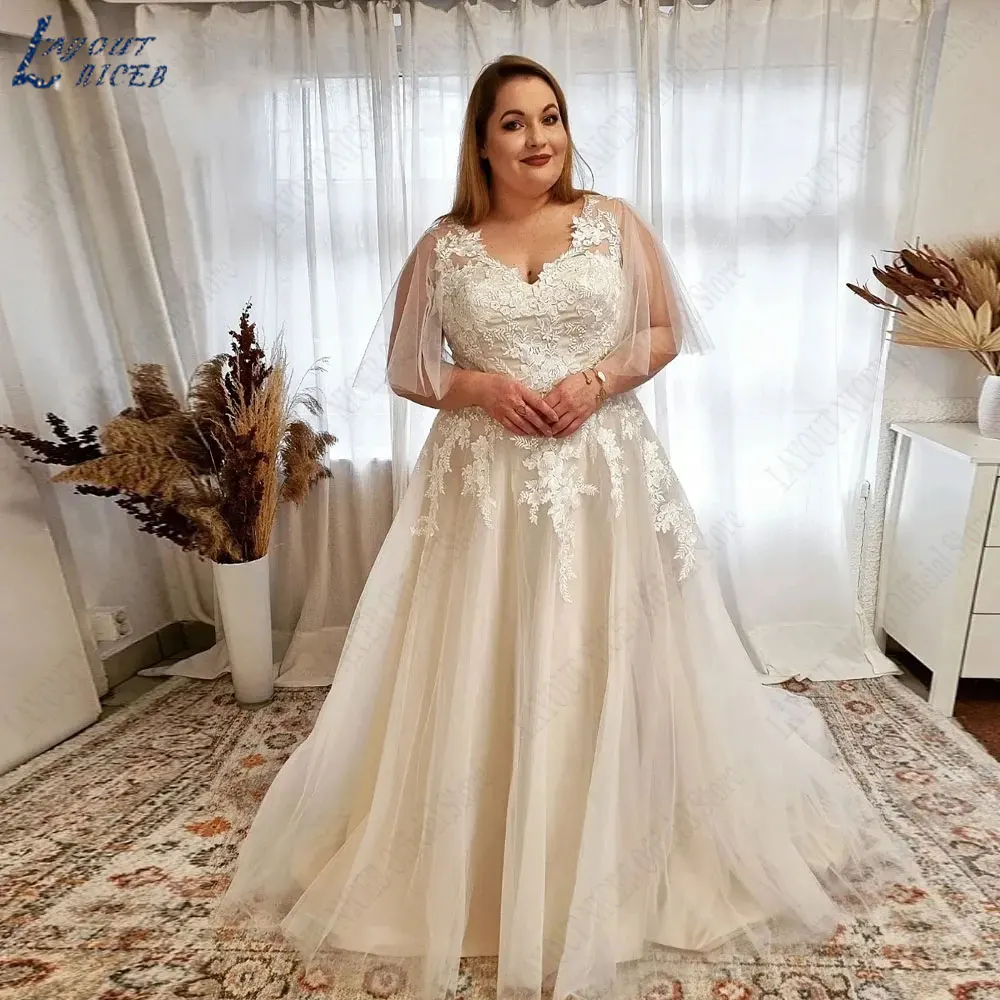 LAYOUT NICEB Appliques Plus size V-hals bruidsjurken A-lijn rugloze bruid jurken back-kant op maat gemaakte vestidos de fiestaLAYOUT NICEB Appliques Plus size V-hals bruidsjurken A-lijn rugloze bruid jurken back-kant o