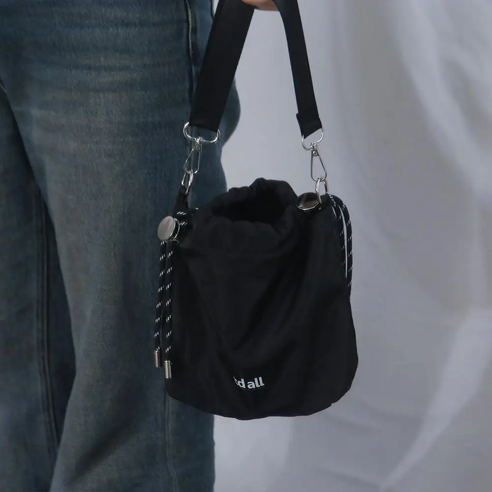 

Simple Korean Style Black Drawstring Bucket Bag Portable Luxury INS Shoulder Bag Nylon Fashion Crossbody Bags Women