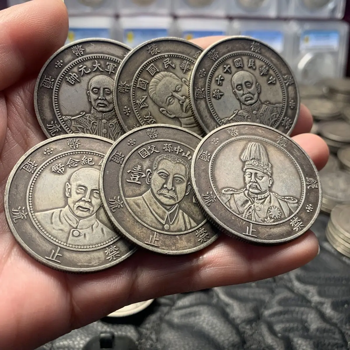 

Six Warlord Sample Coins Silver Dollars