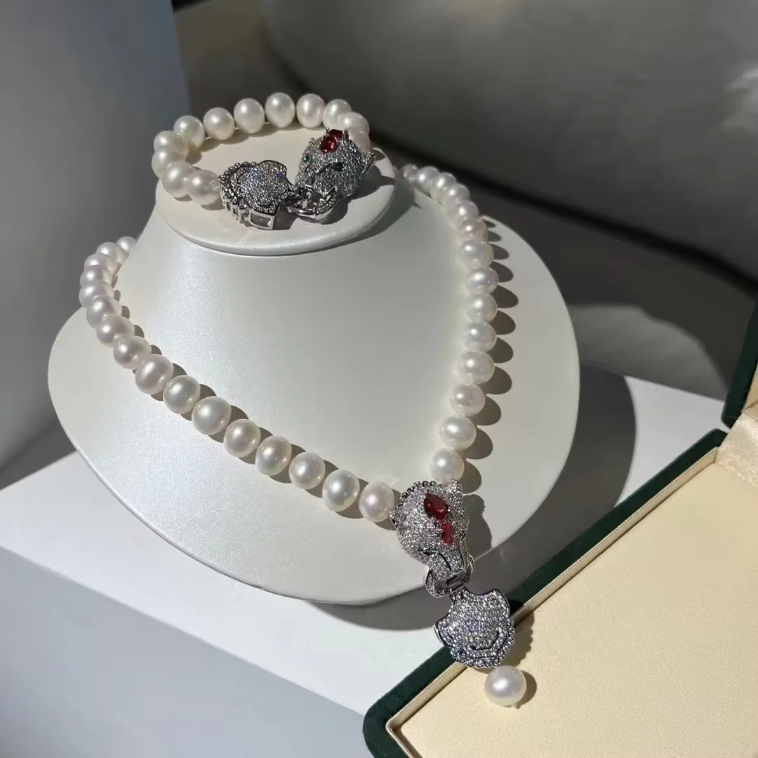 

Набор из ожерелья и браслета из культивированного белого жемчуга 18 дюймов, 11-12 мм, с подвеской с фианитами.