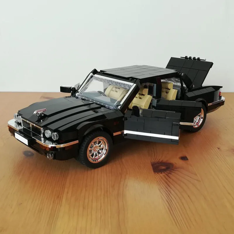 

1112 шт. JaguarS XJ (1998) 14 шпилек, широкие особенности, подробная внутренняя модель Moc, строительные блоки, штабелируемые кирпичи, креативная игрушка в подарок