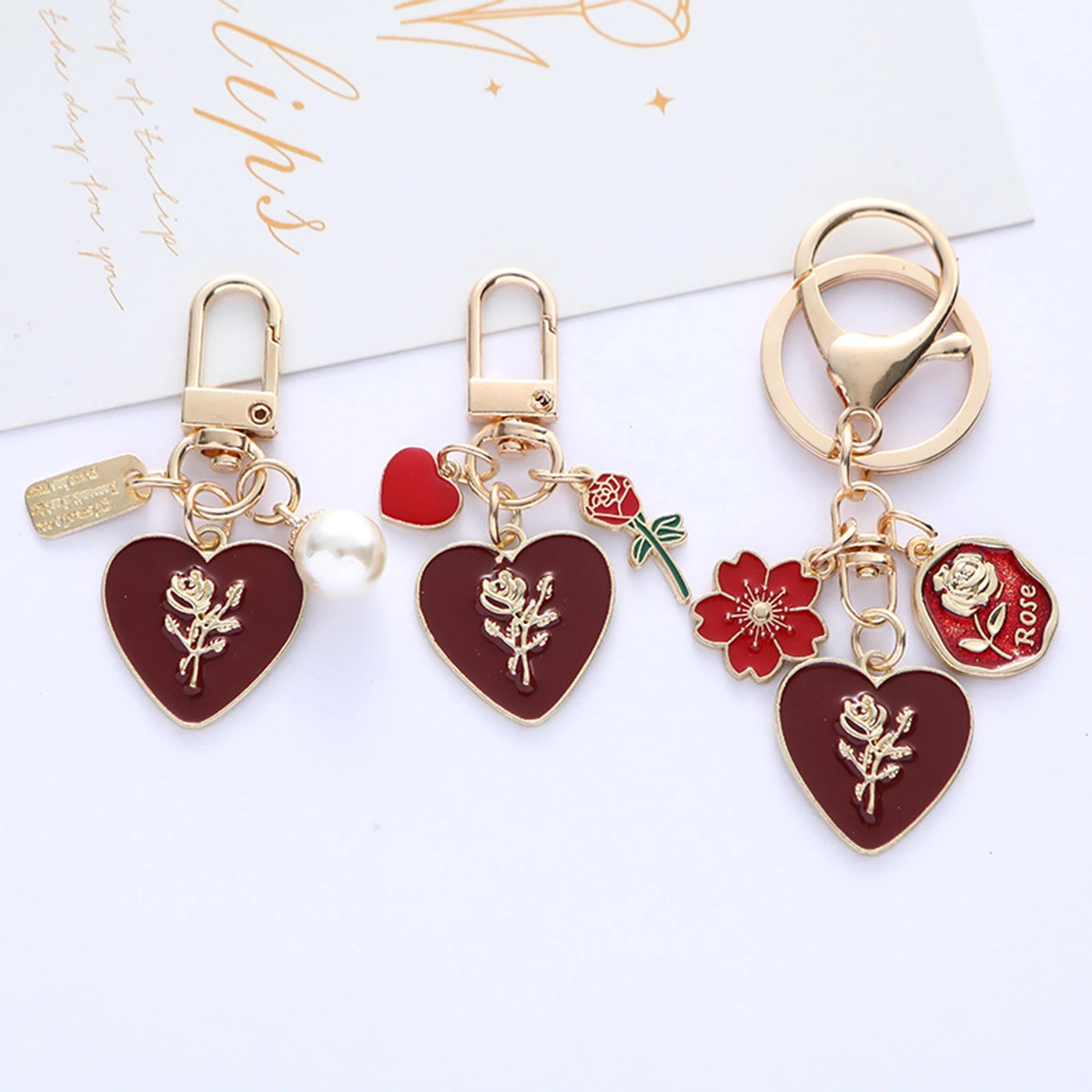 Llavero rosa con etiqueta de amor, colgante de Ángel, perlas, cadena de teléfono, dijes, llavero de coche, accesorios de decoración de bolso