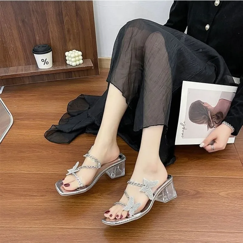 

Ladie's Latest Summer Princess Style Sandals 2026 Silver Butterfly One Strap Medium Heel Clear Design Fashionable Outdoor