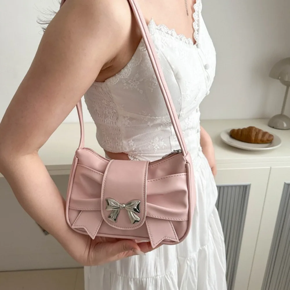 Hoge kwaliteit PU-leer vierkante geplooide handtas Zachte mode Boog okseltas Onderarm waterdichte strik Crossbody tas Meisjes