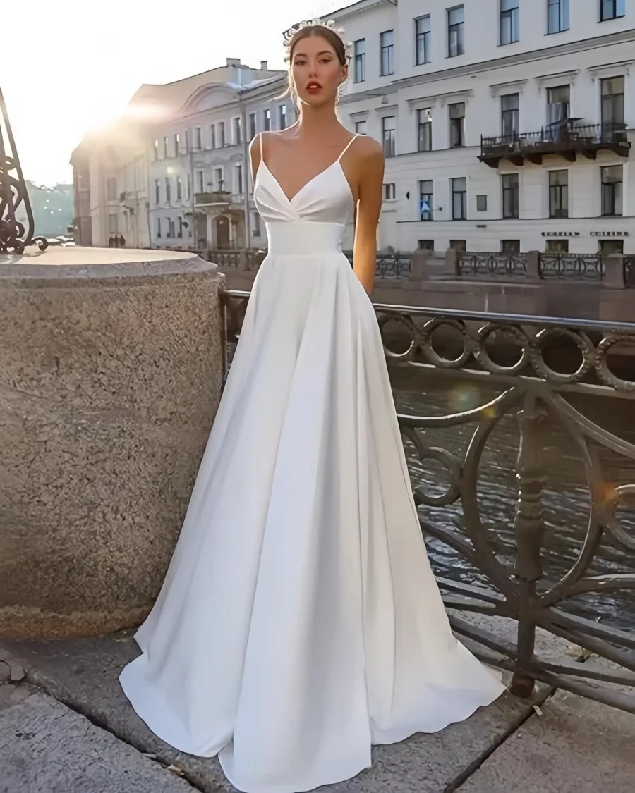 Stunning Satin A-line Wedding Dresses with Spaghetti Strap Gorgeous V-neck Bridal Gown with Sweep Train for Dreaming Wedding