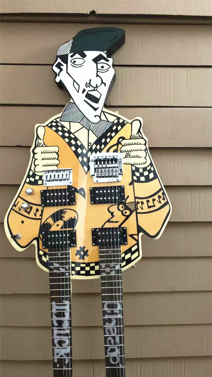 

High quality customized version of human foot electric guitar hand-painted plaid yellow light paint free shipping