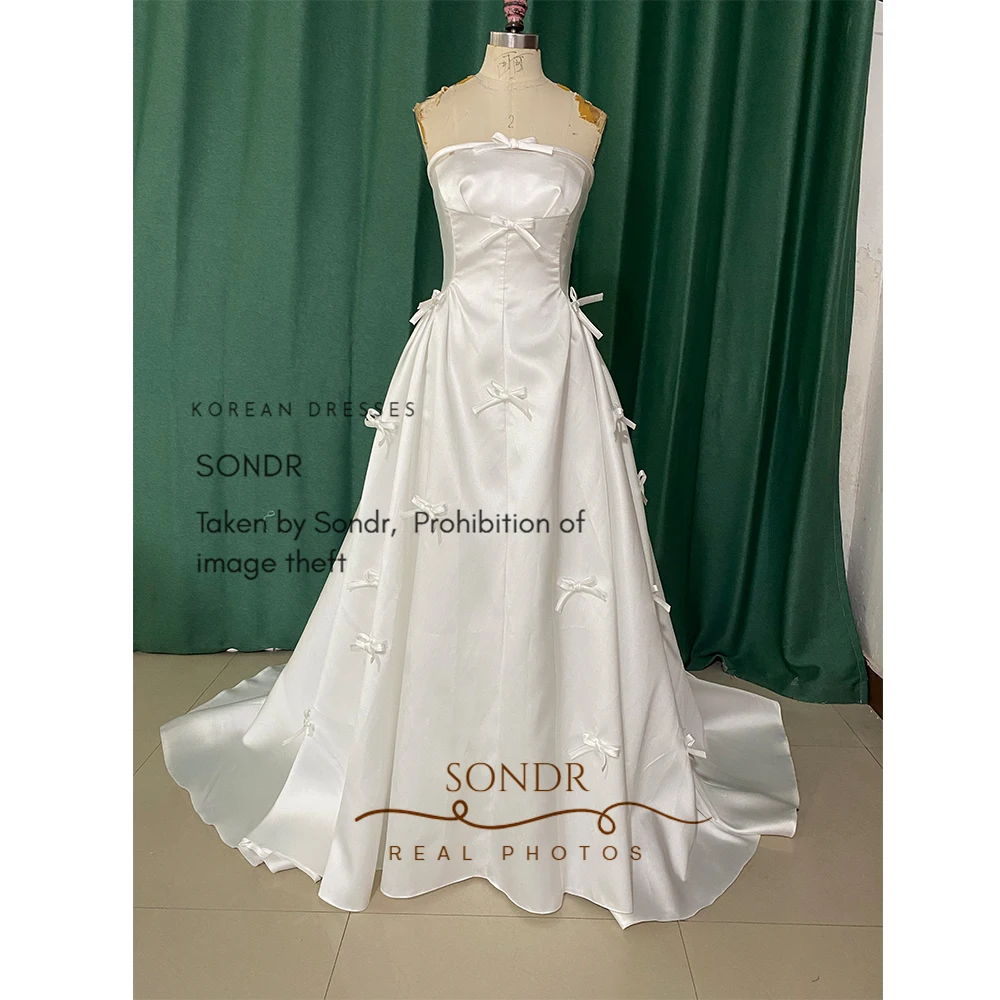 Eleganckie suknie ślubne koreańskie bez ramiączek Sondr, z kokardą, z jedwabnej satyny, gorsetowe, szyte na miarę suknie wieczorowe na przyjęcie.