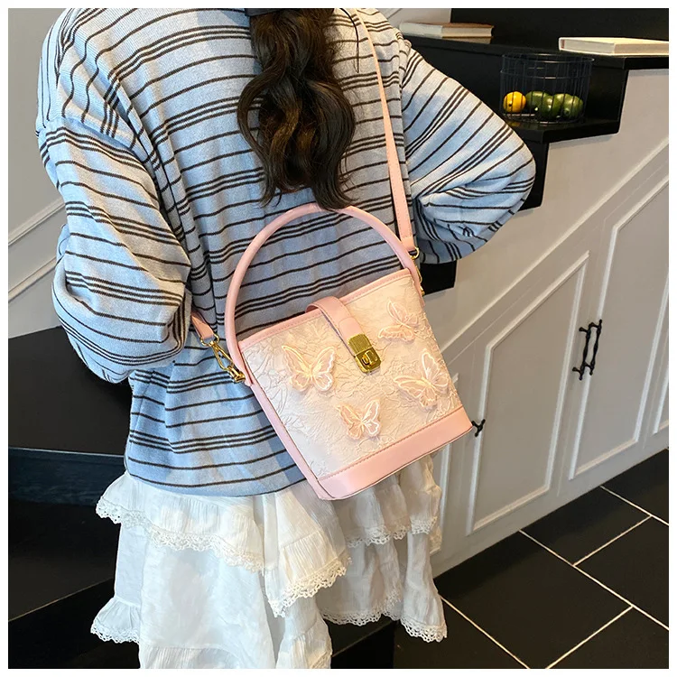 

Cross-border New Small Bag Women's 2025 Fashion Cartoon Portable Bucket Bag Versatile Foreign Texture Commuter Messenger Bag