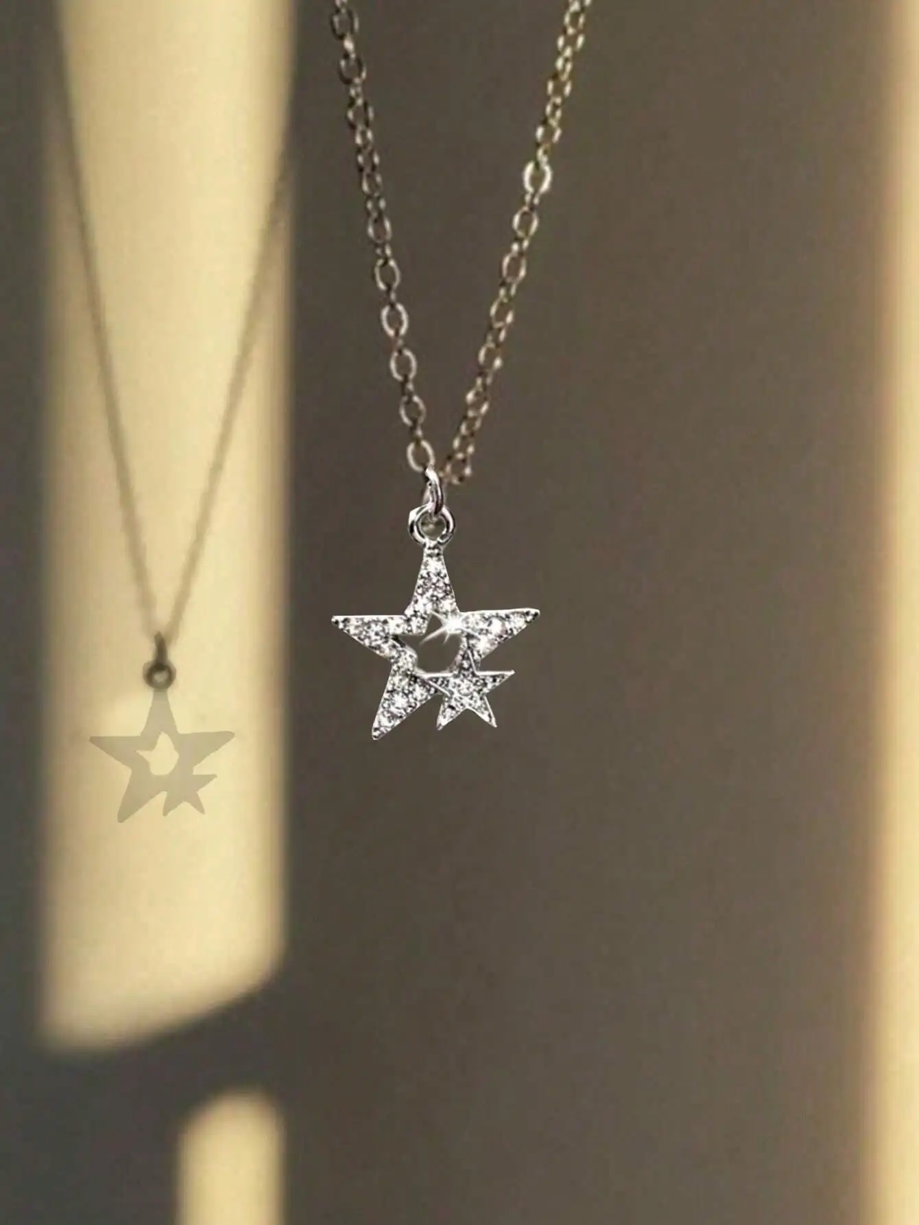 

Stainless Steel Star Pendant Necklace with Rhinestone Accents for Women and Men
