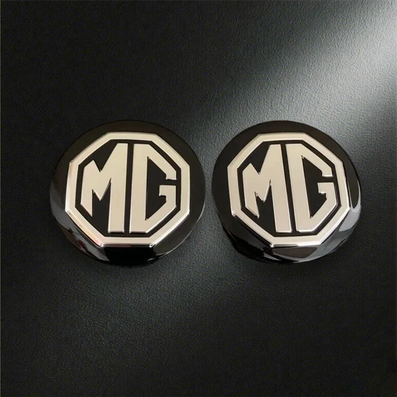 

4Pcs 56mm Car Emblems Wheel Hub Center Cover Cap Holder for Morris Garages MG ZS 5 7 6 Cyberster MG4 EV ES5 HS ONE GT GS MG3 EZS