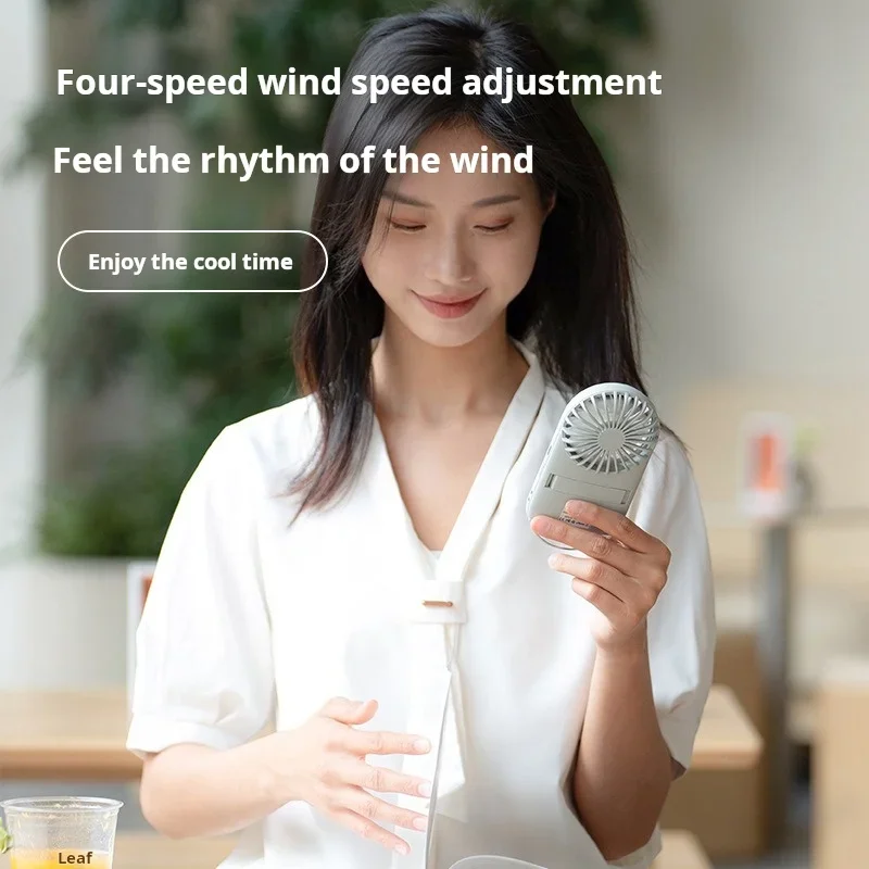 2024Summer Handheld Mini Fan Lightweight Portable Four-Speed Adjustable Built-in Night Light Stylish Design Handheld or Desk Use