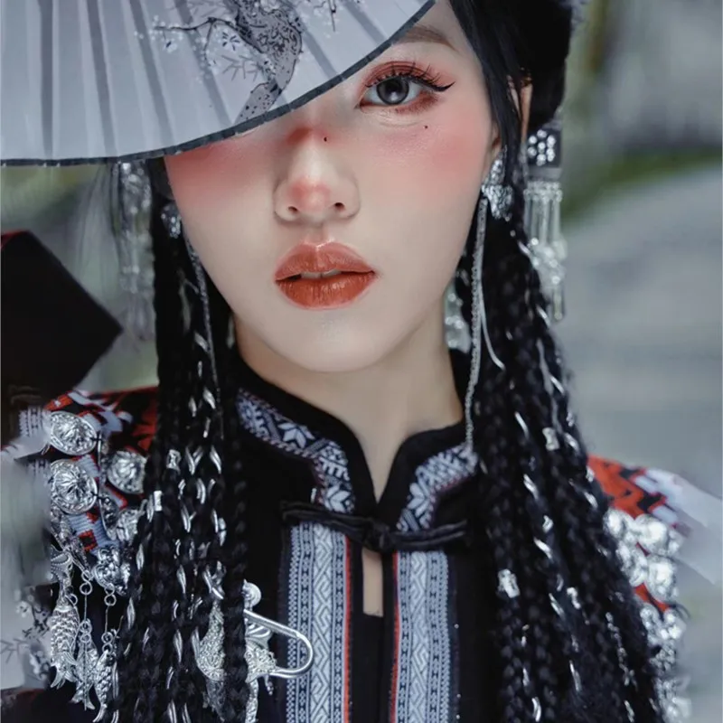 

Embroidery national costume female ethnic style girl studio photo