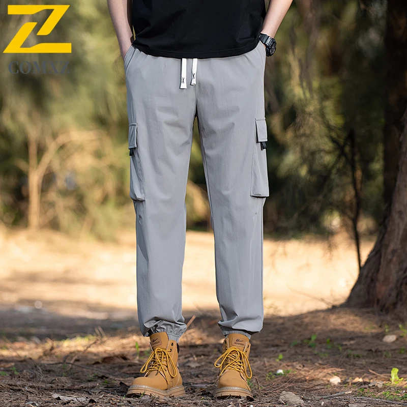 Pantaloni casual da uomo in seta di ghiaccio Pantaloni estivi da lavoro larghi e traspiranti per la nuova pelle Pantaloni stile harem Pantaloni da escursionismo da campeggio multitasche