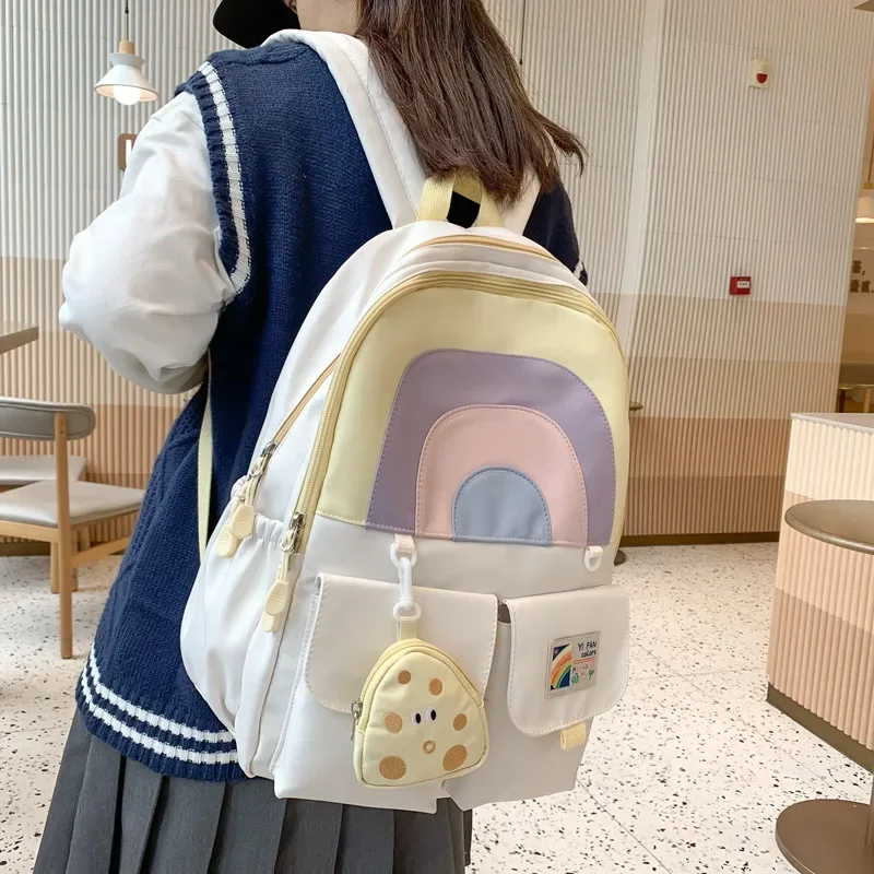 Mochila escolar colorida para estudiantes escolares femeninas, mochila escolar japonesa Simple de gran capacidad con corte de arcoíris y colgante de monedero de queso