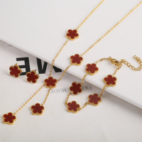 XUANYU Waterproof Hot Selling Plum Blossom New Plant Five Leaf Flower Jewelry Set for Women Asymmetric Stainless Steel Clover