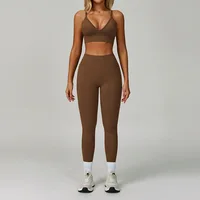 Women’s brown sports bra and high-waisted full-length workout leggings set