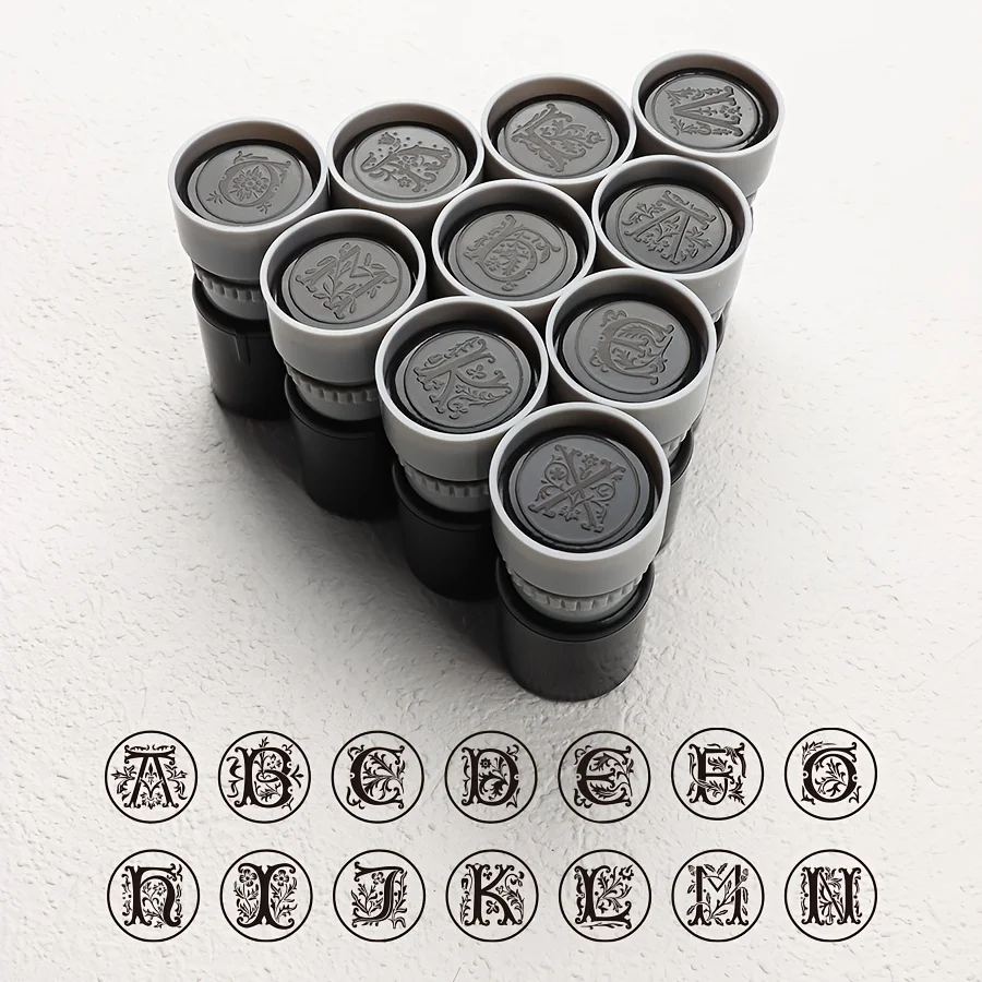 1 black photosensitive seal, 26 English letters, vintage floral design, can be used for bookkeeping and greeting card decoration