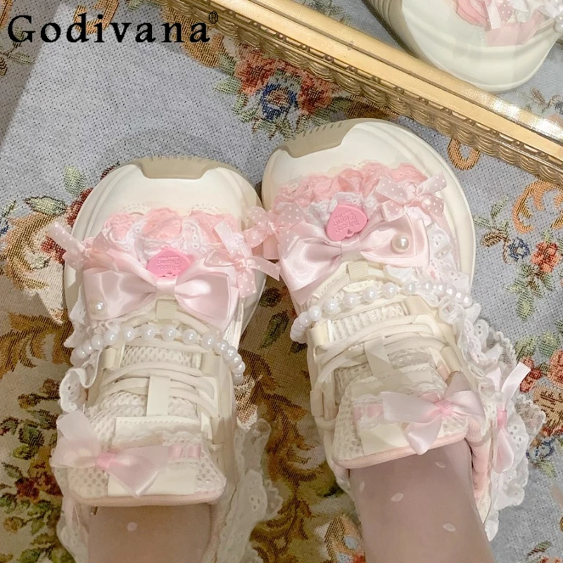 المرأة الارتفاع زيادة أحذية رياضية كاجوال الأصلي مقوس دانتيل اللؤلؤ الشريط أحذية الإناث لطيف الحلو سميكة سوليد لوليتا الأحذية