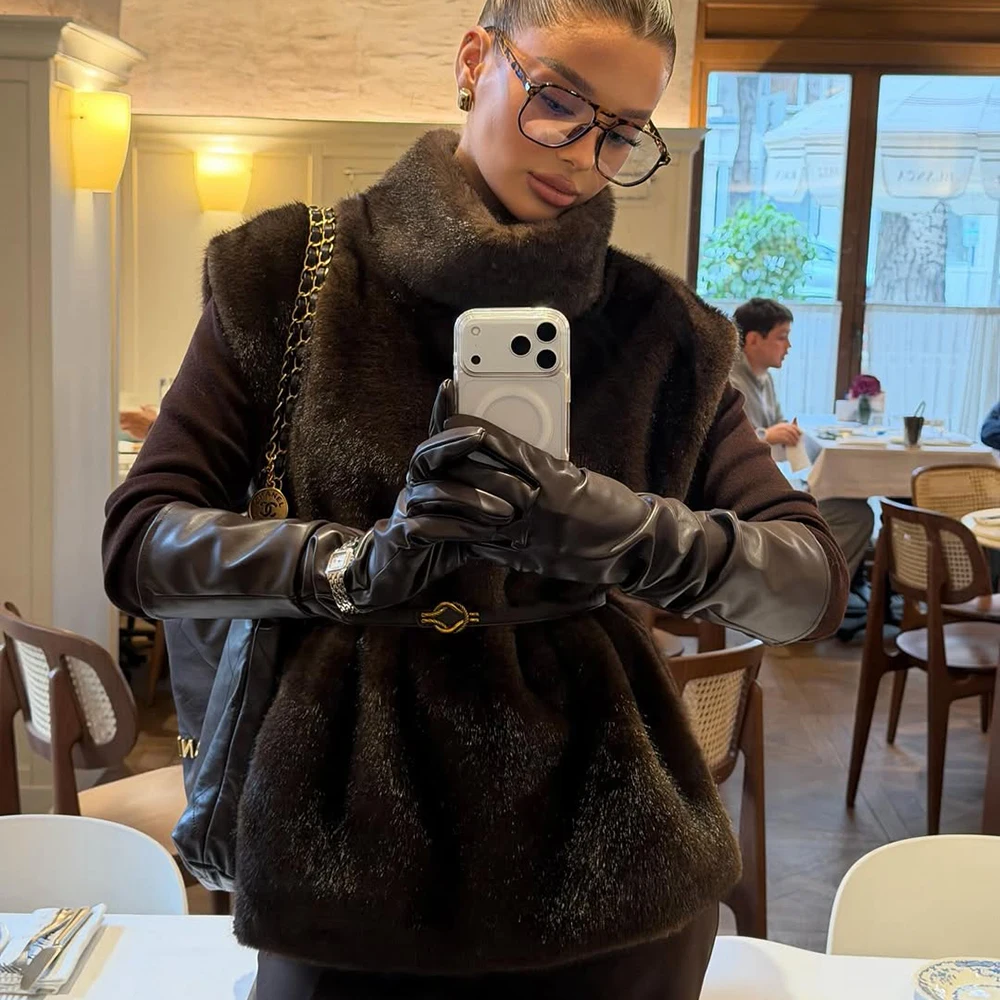 سترات من الفرو الصناعي الصلبة من Talenza سترات نسائية عصرية بياقة مدورة منفوشة قطع علوية شتوية أنيقة بدون أكمام معاطف