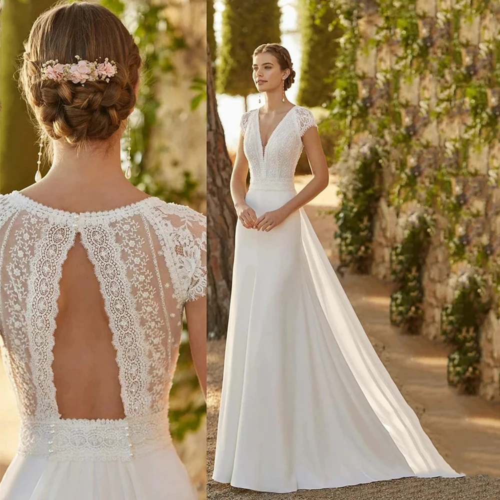 Gorgeous Sexy Backless Sleeveless Mopping Wedding Dresses Beach Women Illusion Back Lace Appliques V-Neck A-Line Bridal Gown