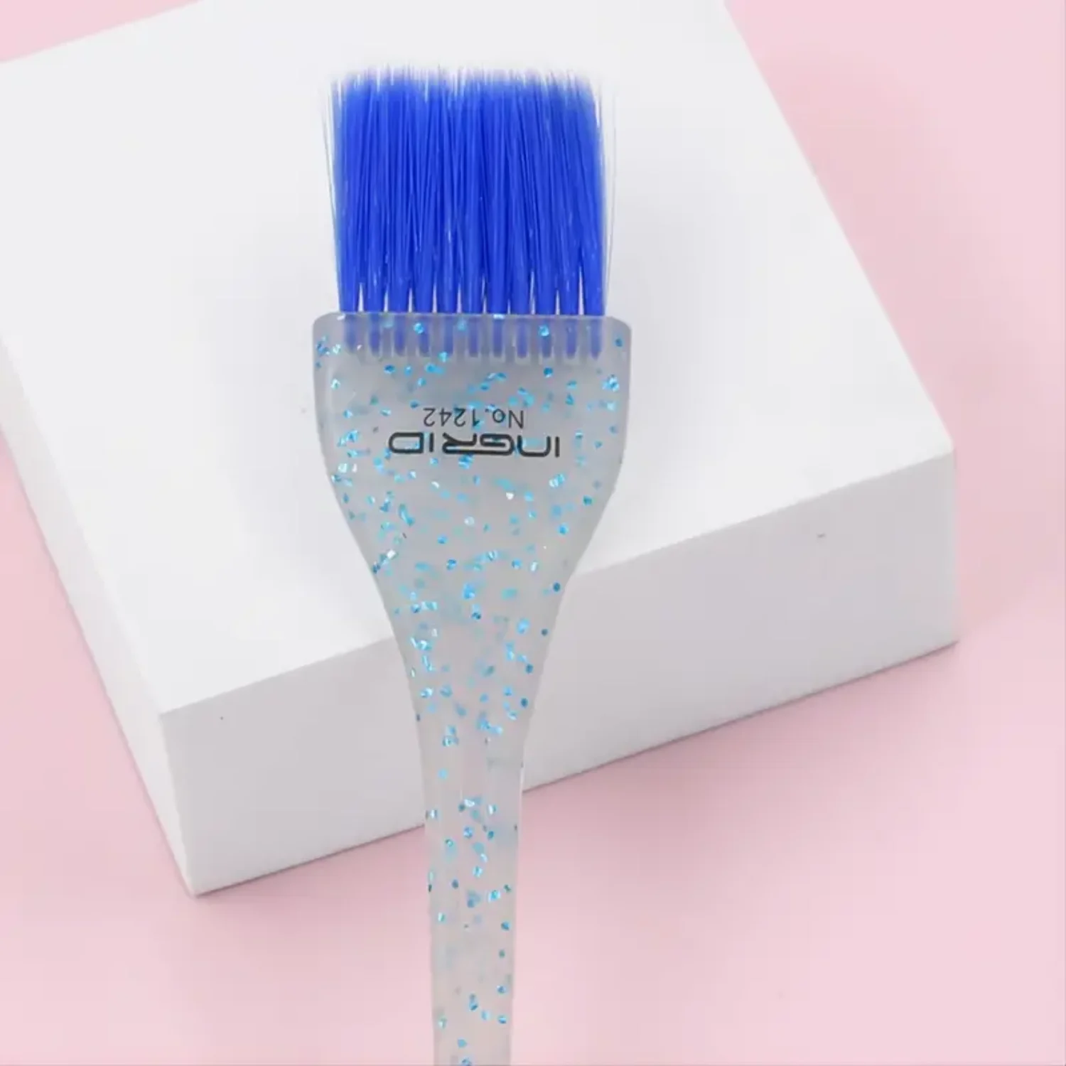 Luxury Glitter Brush with Soft Feathered Bristles and Cosmic Multicolor Handle for Stunning Makeup Results