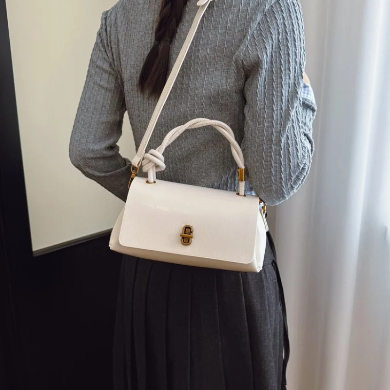 High-End Women's Messenger Bag Made Of Star-Patterned Leather Boasting Paris Style And High-End Commuter Look​