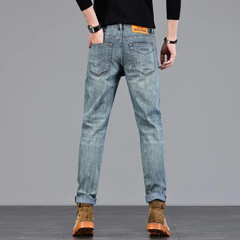 Jeans de ajuste fino elástico de negócios jovens para primavera e verão 2025 masculino casual confortável versátil calças de perna reta pequena