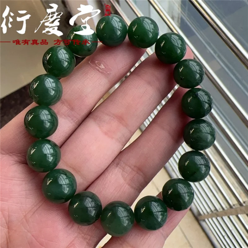 

and Hetian bracelet, spinach , light green with few black spots, single-loop, unisex round bead jadeite bra