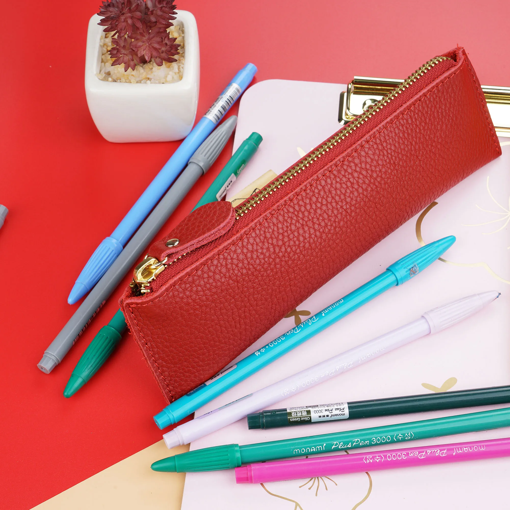 AIGUONIU جلد طبيعي سستة القلم مقلمة حقيبة الليتشي تنقش الجلود الإبداعية المدرسة القرطاسية مقلمة جلدية