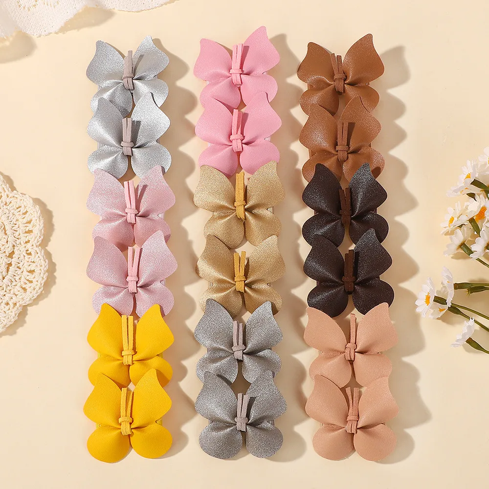 Zufällige Farbe 20 Stück PU-Leder Schmetterling Haarspangen für Kinder Süße Mädchen Haarnadeln Haarklammern Niedliche Haaraccessoires für Mädchen
