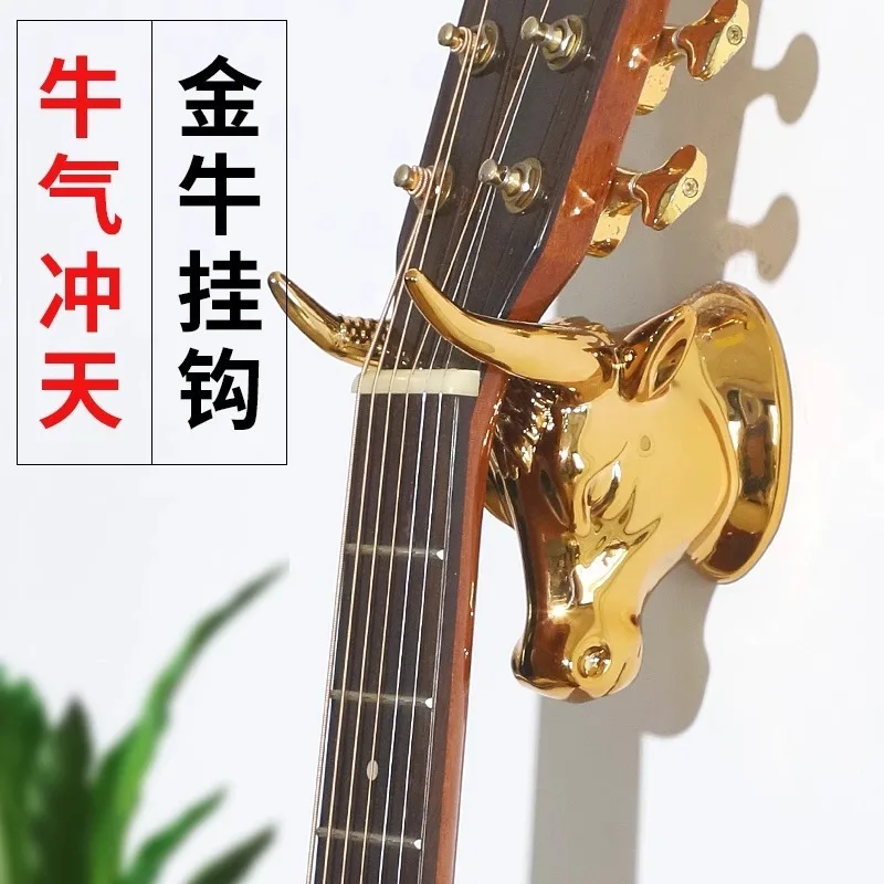 Luxuriöser Goldener Stierkopf-Gitarrenhalter Wandmontage-Haken Bass-Ukulele-Stützständer Dekorative Aufbewahrungshalterung für Zuhause
