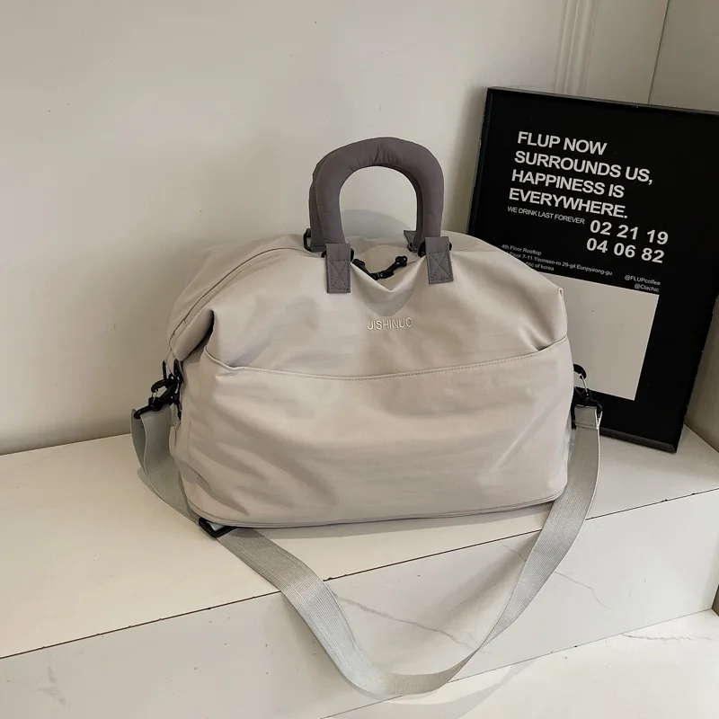 waterproof-nylon-gym-duffel-bag-women's-weekender-travel-tote-with-shoe-compartment-wet-pocket-and-padded-handle