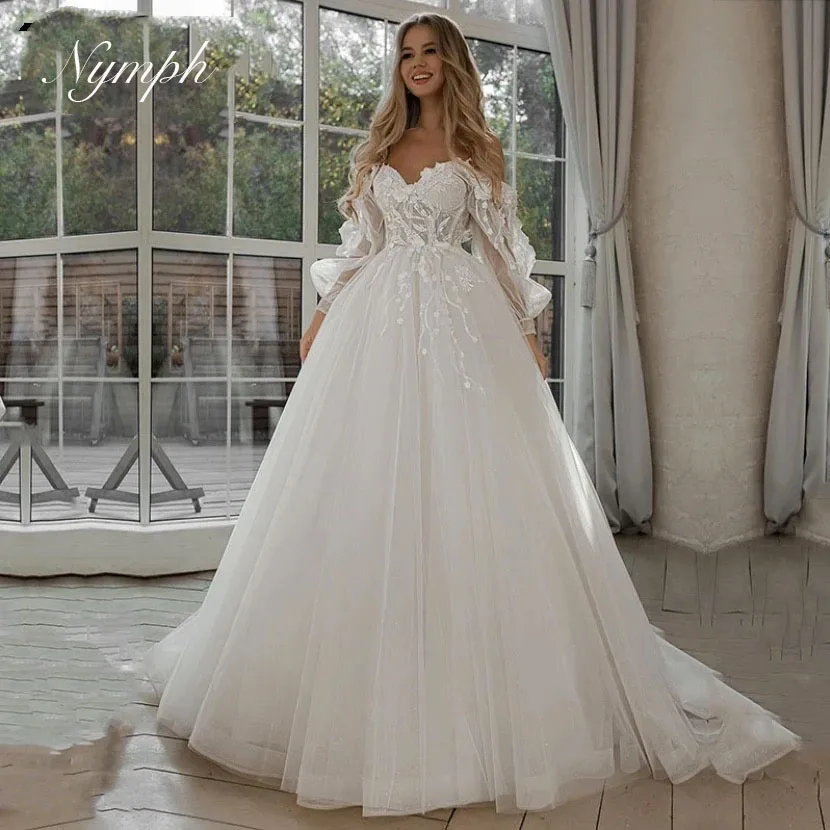 Maßgeschneiderte schulterfreie Spitze Glitzer A-Linie Brautkleider Lange Puffärmel 3D-Blumen Boho Brautkleid 2024 Vestidos De Novia