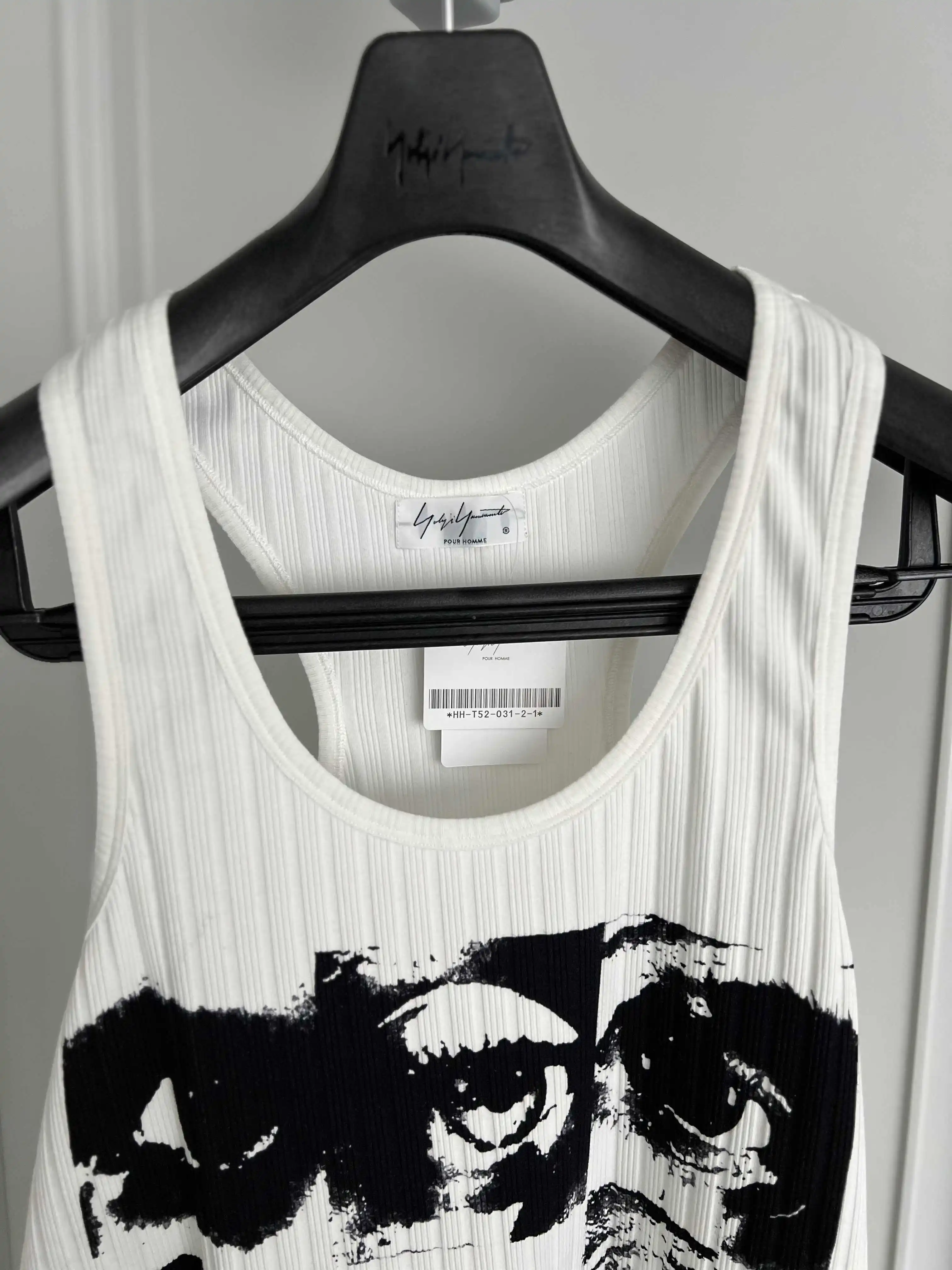 TOP-YAMAMOTO's original design features a face-covering portrait pattern with a short-sleeved mulberry silk print