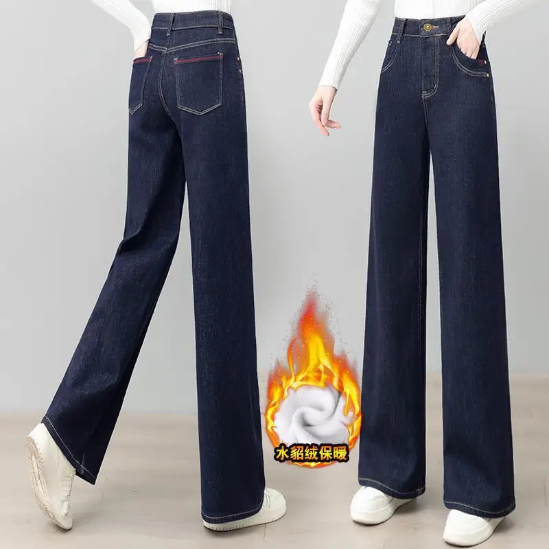 Jeans da donna Pantaloni invernali a gamba larga blu scuro ispessiti foderati in pile da donna stile autunno e inverno