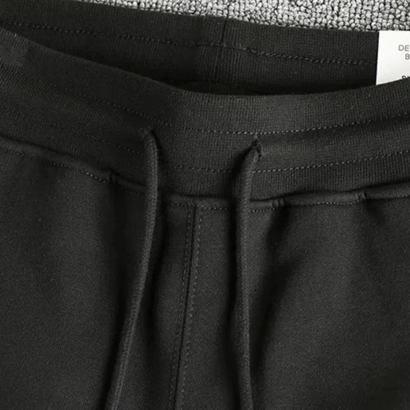 بنطال رياضي كاجوال بشريط بتصميم شق للرجال بنطال رياضي فضفاض بأرجل مستقيمة على الطراز الأمريكي