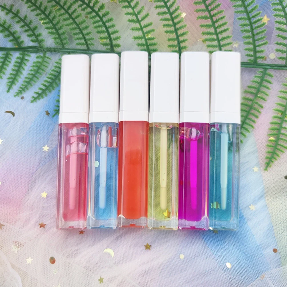 

Custom Bulk Lip Oil Private Label 23-color Fruit Flavor Plumping Doodle Lips Moisturizing Makeup Remove Dead Skin White Lid