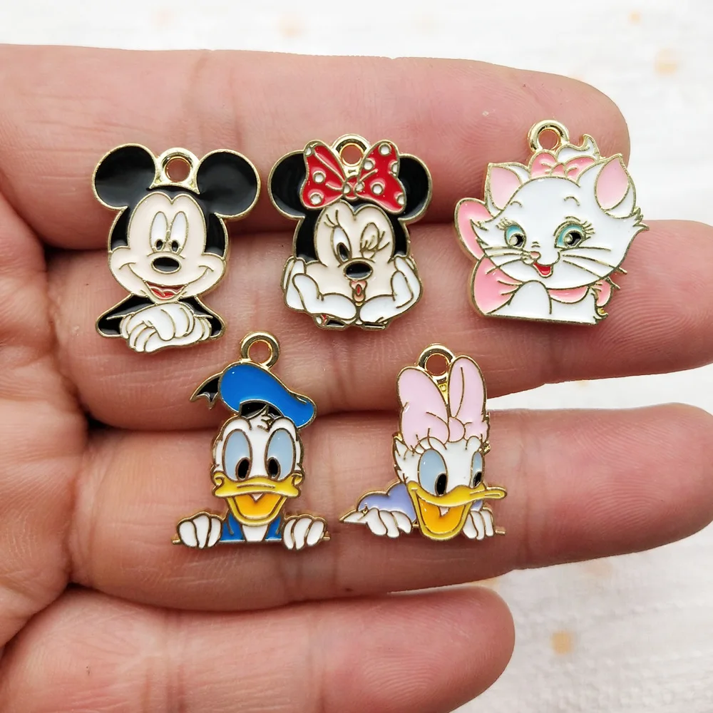 

10 шт. металлических подвесок-шармов с персонажами: кошка Мари, Минни, Микки Маус, Дейзи Дак, Дональд Дак. Материал для изготовления серег, кулонов, ожерелий, брелоков, для рукоделия.