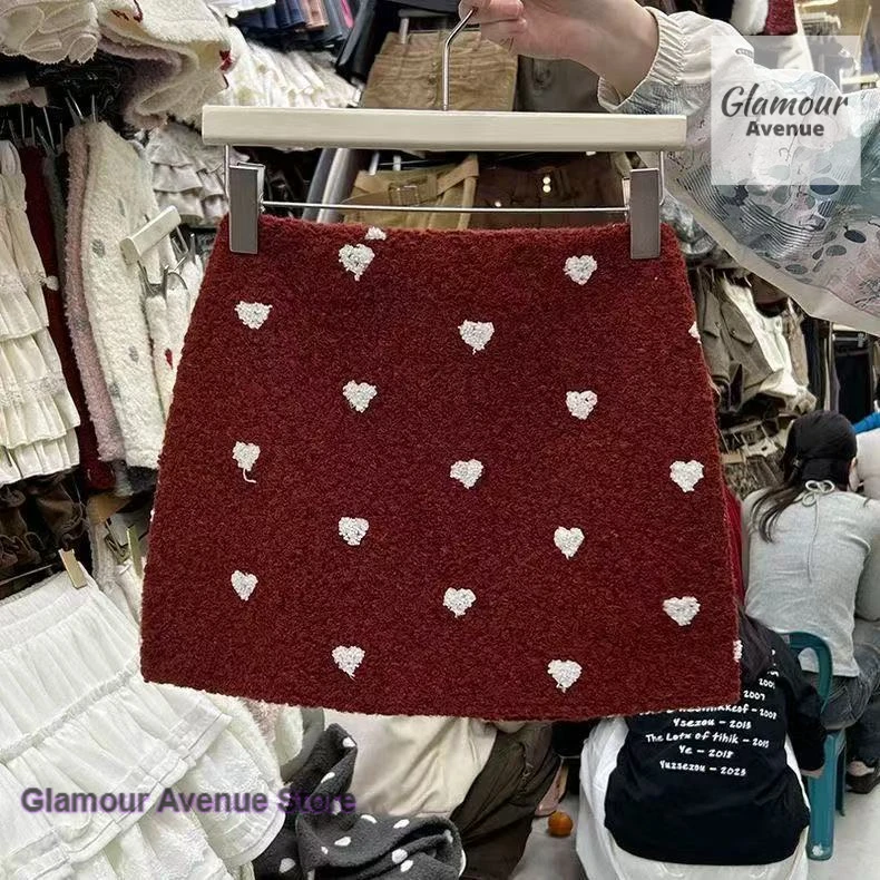 Korean woolen polka-dot love sweet short skirt women's autumn and winter new temperament thickened warm fashion hip skirt.