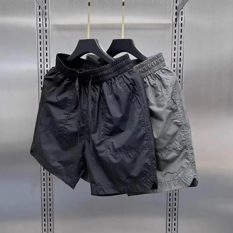 

Летние новые мужские сетчатые дышащие универсальные свободные шорты-бриджи, повседневные, быстросохнущие, простой тонкий стиль