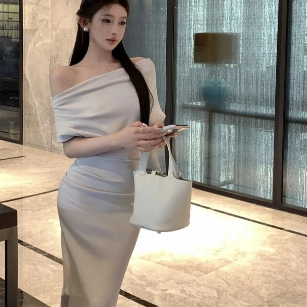 Lange schuine schouder lange jurk effen kleur off-shoulder slim fit lange rok Franse zoete beige abrikoos Koreaanse stijl jurk club