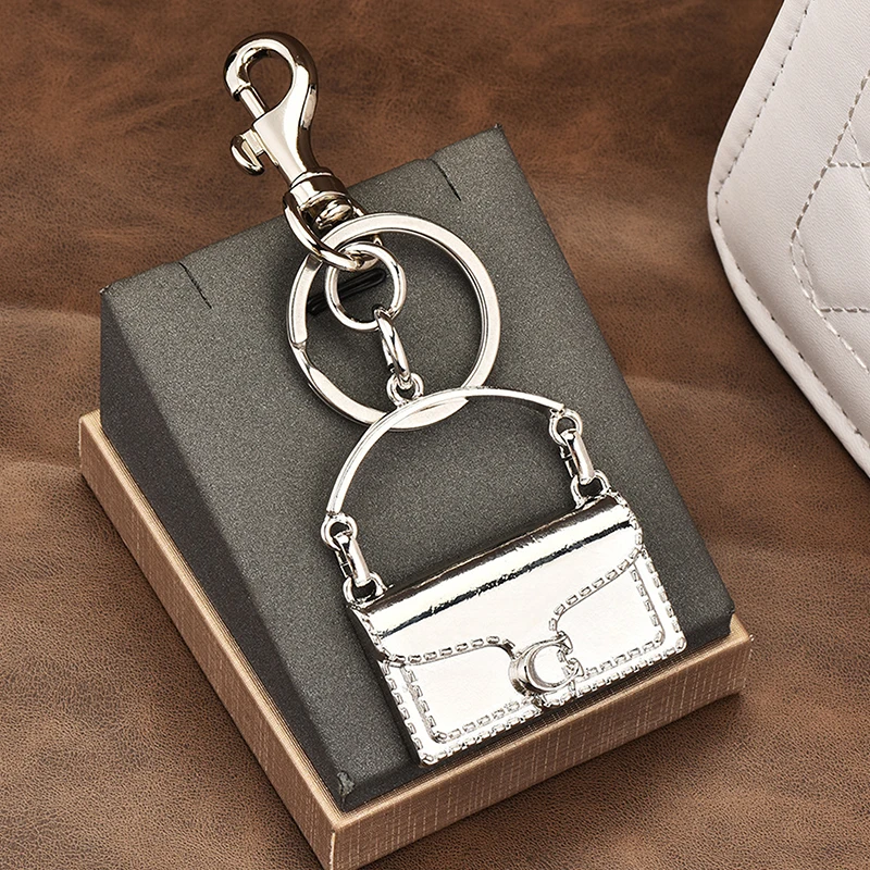 العصرية الرائعة حقيبة يد صغيرة شكل المفاتيح قلادة للنساء حلية معدنية كيرينغ ظهره اكسسوارات الديكور الهدايا