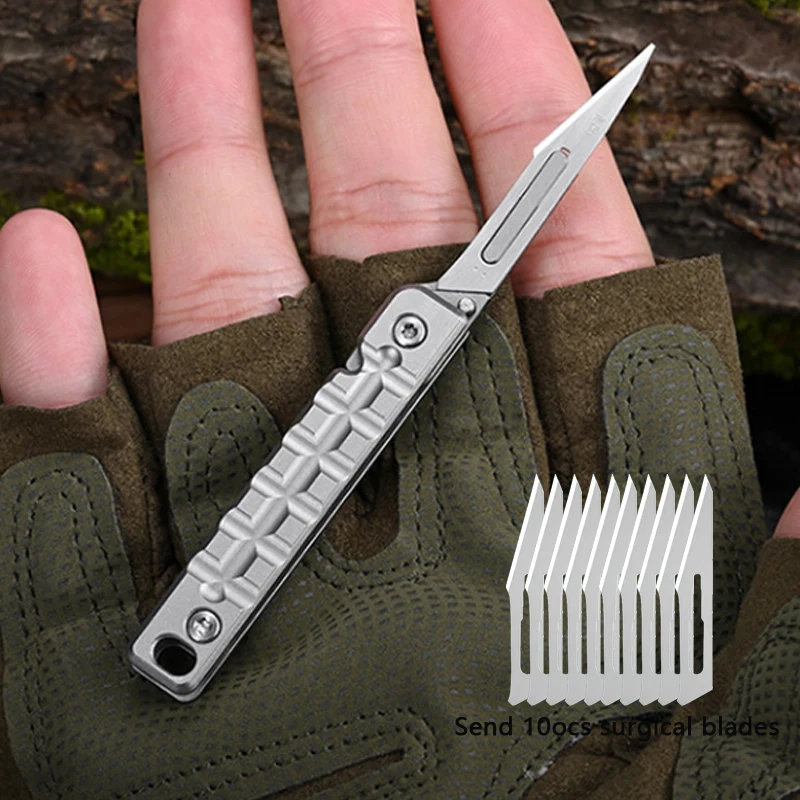 

Mini Stainless Steel Folding Knife All Steel Outdoor Open Box Fishing EDC Surgical Knife Comes with 10pcs Blades