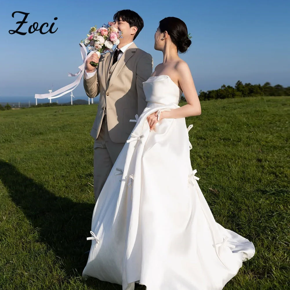 

Zoci Classic Strapless Korea Wedding Dresses Satin A Line Customized Photos Shoot Dress Ribbons Bow Corset Backless Bridal Gown