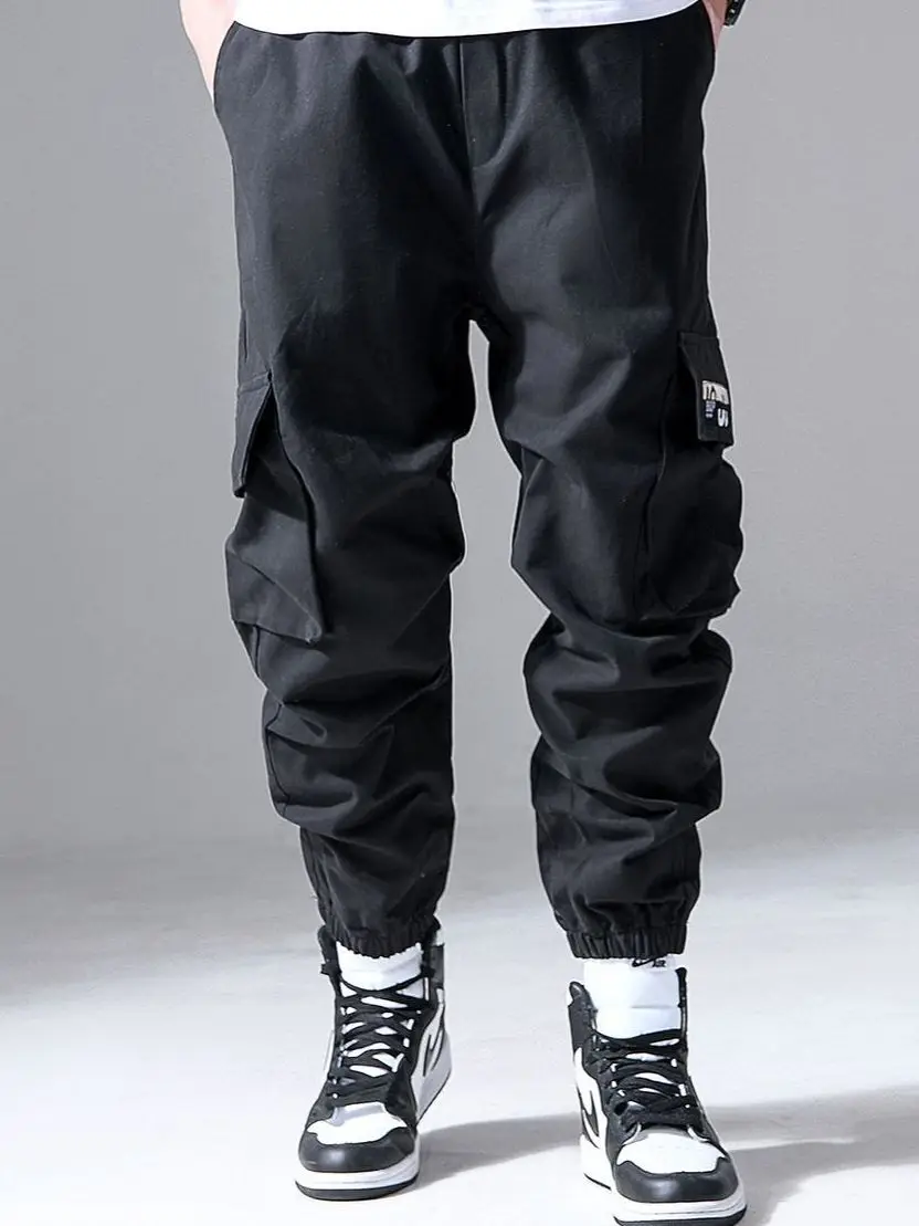 Moda męska Hip Hop Cargo spodnie z wieloma kieszeniami modna odzież uliczna solidne spodnie dresowe Casual bawełniane biegacze męskie — zdjęcie 2