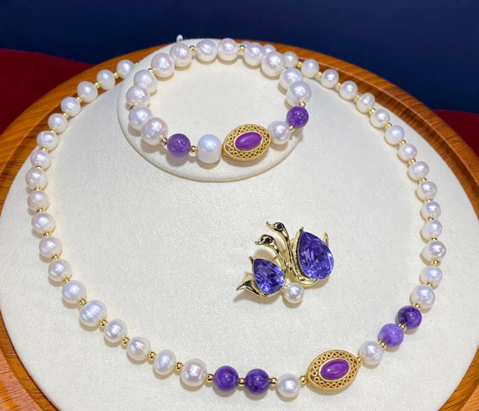 

Ожерелье из натурального белого пресноводного жемчуга диаметром 8-10 мм + браслет + набор броши