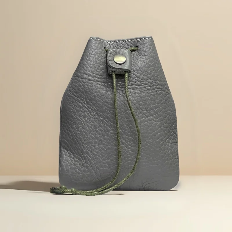 New Cow Leather Women's and Men's Drawstring Change Vintage Coin Bag Headphone Strap Purse Storage Bag For Man And Woman