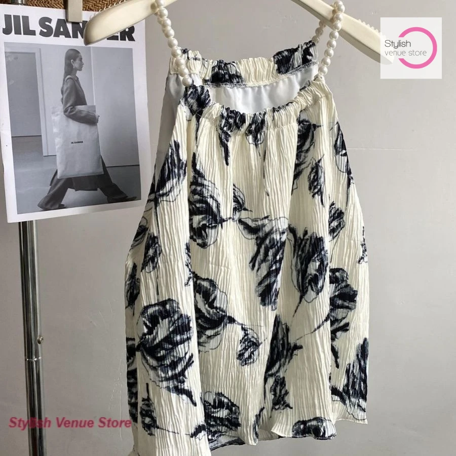 

French high-grade floral camisole women's summer new fashion ink printing is unique and chic, wearing a sweet and spicy blouse.